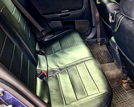 Синій Міцубісі Lancer, об'ємом двигуна 2 л та пробігом 248 тис. км за 5000 $, фото 6 на Automoto.ua