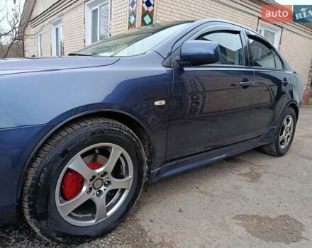 Синий Мицубиси Лансер, объемом двигателя 1.5 л и пробегом 211 тыс. км за 5222 $, фото 11 на Automoto.ua