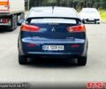 Синій Міцубісі Lancer, об'ємом двигуна 2 л та пробігом 170 тис. км за 7500 $, фото 4 на Automoto.ua