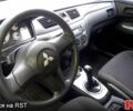 Мицубиси Лансер 2007 в Гайсине на Automoto.ua Синий Мицубиси Лансер, объемом двигателя 1.6 л и пробегом 274 тыс. км за 2700 $, фото 5 на Automoto.ua