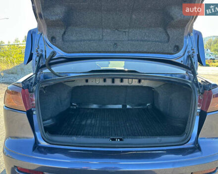 Синій Міцубісі Lancer, об'ємом двигуна 2 л та пробігом 240 тис. км за 6800 $, фото 8 на Automoto.ua