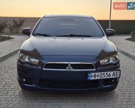 Синій Міцубісі Lancer, об'ємом двигуна 2 л та пробігом 234 тис. км за 6700 $, фото 1 на Automoto.ua