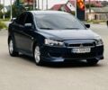 Синий Мицубиси Лансер, объемом двигателя 2 л и пробегом 178 тыс. км за 6250 $, фото 1 на Automoto.ua