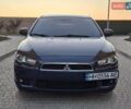Синій Міцубісі Lancer, об'ємом двигуна 2 л та пробігом 234 тис. км за 6700 $, фото 1 на Automoto.ua