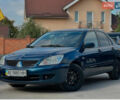 Синій Міцубісі Lancer, об'ємом двигуна 1.58 л та пробігом 224 тис. км за 3999 $, фото 1 на Automoto.ua