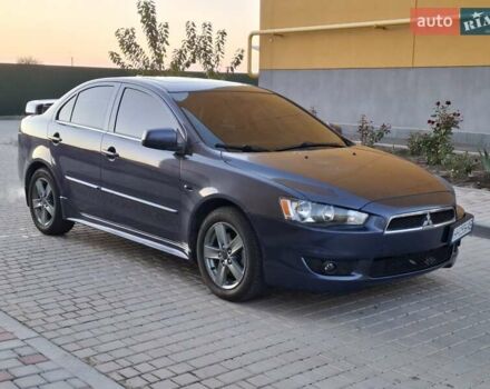 Синій Міцубісі Lancer, об'ємом двигуна 2 л та пробігом 234 тис. км за 6700 $, фото 9 на Automoto.ua