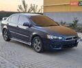 Синій Міцубісі Lancer, об'ємом двигуна 2 л та пробігом 234 тис. км за 6700 $, фото 9 на Automoto.ua