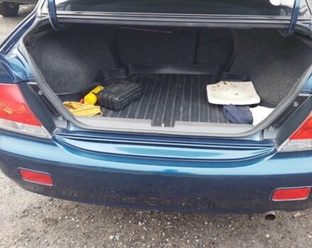 Синий Мицубиси Лансер, объемом двигателя 1.6 л и пробегом 87 тыс. км за 7000 $, фото 8 на Automoto.ua