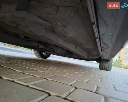 Синій Міцубісі Lancer, об'ємом двигуна 2 л та пробігом 234 тис. км за 6700 $, фото 18 на Automoto.ua