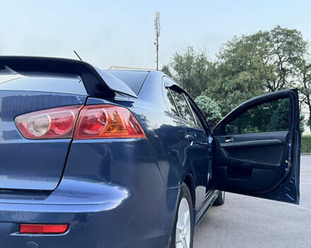Синій Міцубісі Lancer, об'ємом двигуна 2 л та пробігом 282 тис. км за 6700 $, фото 15 на Automoto.ua