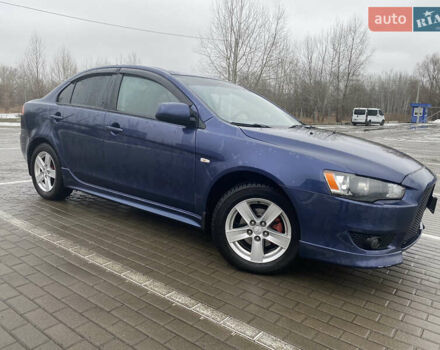 Синий Мицубиси Лансер, объемом двигателя 2 л и пробегом 193 тыс. км за 6800 $, фото 1 на Automoto.ua