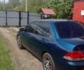 Синий Мицубиси Лансер, объемом двигателя 1.6 л и пробегом 300 тыс. км за 4141 $, фото 1 на Automoto.ua