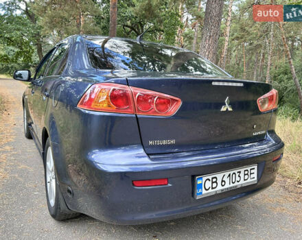 Синий Мицубиси Лансер, объемом двигателя 2 л и пробегом 312 тыс. км за 5750 $, фото 9 на Automoto.ua