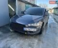 Синий Мицубиси Лансер, объемом двигателя 2 л и пробегом 230 тыс. км за 6600 $, фото 1 на Automoto.ua