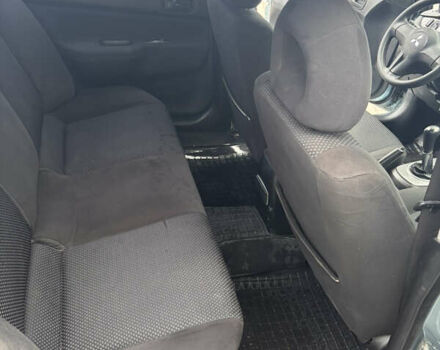 Синий Мицубиси Лансер, объемом двигателя 1.6 л и пробегом 238 тыс. км за 3500 $, фото 7 на Automoto.ua