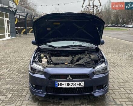 Синій Міцубісі Lancer, об'ємом двигуна 2 л та пробігом 210 тис. км за 6800 $, фото 28 на Automoto.ua