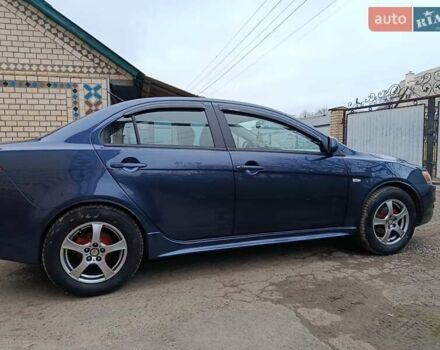 Синий Мицубиси Лансер, объемом двигателя 1.5 л и пробегом 211 тыс. км за 5222 $, фото 5 на Automoto.ua