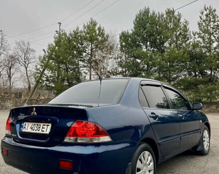 Синий Мицубиси Лансер, объемом двигателя 1.6 л и пробегом 184 тыс. км за 4950 $, фото 8 на Automoto.ua