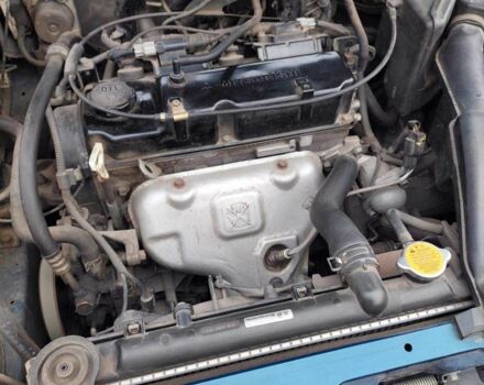 Синий Мицубиси Лансер, объемом двигателя 1.6 л и пробегом 87 тыс. км за 7000 $, фото 4 на Automoto.ua