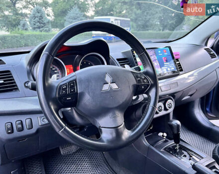Синій Міцубісі Lancer, об'ємом двигуна 2 л та пробігом 282 тис. км за 6700 $, фото 25 на Automoto.ua
