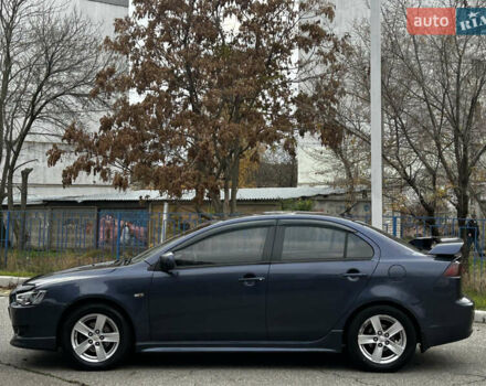 Синій Міцубісі Lancer, об'ємом двигуна 2 л та пробігом 222 тис. км за 5999 $, фото 5 на Automoto.ua