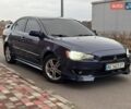 Синий Мицубиси Лансер, объемом двигателя 2 л и пробегом 353 тыс. км за 6999 $, фото 1 на Automoto.ua