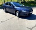 Синій Міцубісі Lancer, об'ємом двигуна 2 л та пробігом 300 тис. км за 5850 $, фото 4 на Automoto.ua
