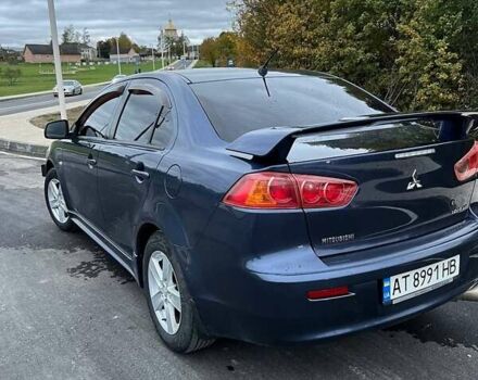 Синій Міцубісі Lancer, об'ємом двигуна 2 л та пробігом 190 тис. км за 6700 $, фото 7 на Automoto.ua