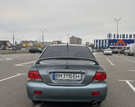 Синий Мицубиси Лансер, объемом двигателя 1.6 л и пробегом 238 тыс. км за 3500 $, фото 4 на Automoto.ua