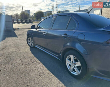 Синій Міцубісі Lancer, об'ємом двигуна 2 л та пробігом 240 тис. км за 6800 $, фото 3 на Automoto.ua