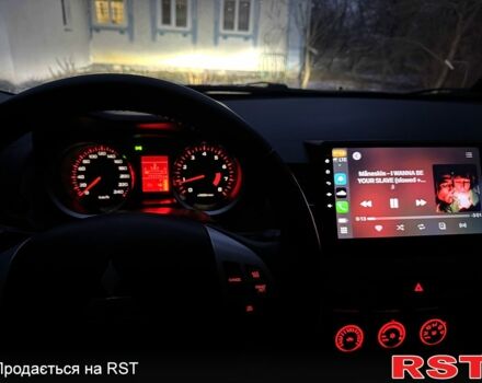 Синий Мицубиси Лансер, объемом двигателя 2 л и пробегом 176 тыс. км за 6400 $, фото 3 на Automoto.ua