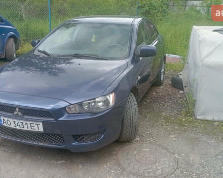 Синий Мицубиси Лансер, объемом двигателя 1.47 л и пробегом 172 тыс. км за 6350 $, фото 1 на Automoto.ua