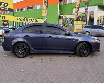 Синій Міцубісі Lancer, об'ємом двигуна 2 л та пробігом 189 тис. км за 7350 $, фото 6 на Automoto.ua