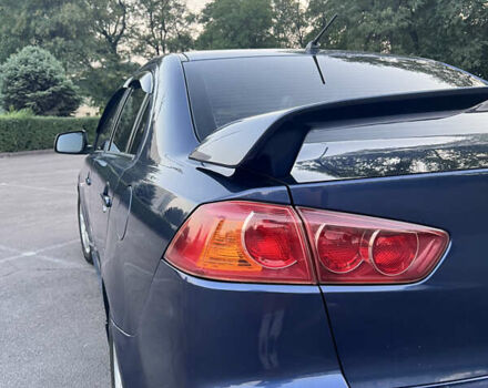Синій Міцубісі Lancer, об'ємом двигуна 2 л та пробігом 282 тис. км за 6700 $, фото 11 на Automoto.ua