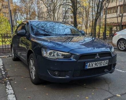 Синий Мицубиси Лансер, объемом двигателя 2 л и пробегом 300 тыс. км за 6250 $, фото 1 на Automoto.ua
