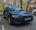 Синий Мицубиси Лансер, объемом двигателя 2 л и пробегом 300 тыс. км за 6250 $, фото 1 на Automoto.ua