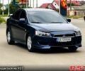 Синий Мицубиси Лансер, объемом двигателя 2 л и пробегом 175 тыс. км за 6800 $, фото 1 на Automoto.ua