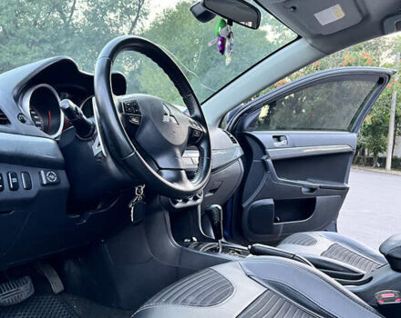 Синій Міцубісі Lancer, об'ємом двигуна 2 л та пробігом 282 тис. км за 6700 $, фото 23 на Automoto.ua