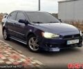 Синий Мицубиси Лансер, объемом двигателя 2 л и пробегом 353 тыс. км за 6999 $, фото 1 на Automoto.ua
