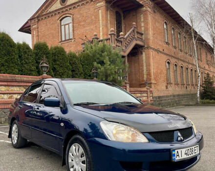 Синий Мицубиси Лансер, объемом двигателя 1.6 л и пробегом 185 тыс. км за 4950 $, фото 2 на Automoto.ua