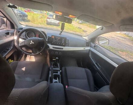 Синий Мицубиси Лансер, объемом двигателя 1.47 л и пробегом 250 тыс. км за 4500 $, фото 11 на Automoto.ua