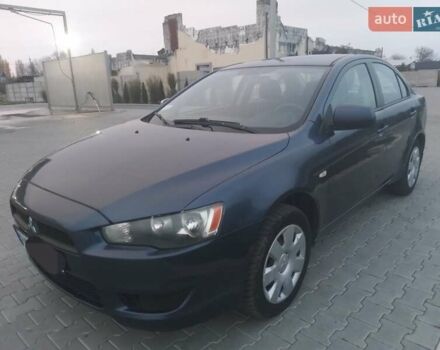 Синий Мицубиси Лансер, объемом двигателя 1.5 л и пробегом 260 тыс. км за 5000 $, фото 1 на Automoto.ua