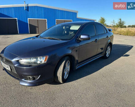 Синій Міцубісі Lancer, об'ємом двигуна 2 л та пробігом 240 тис. км за 6800 $, фото 5 на Automoto.ua