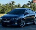 Синій Міцубісі Lancer, об'ємом двигуна 2 л та пробігом 255 тис. км за 6500 $, фото 6 на Automoto.ua
