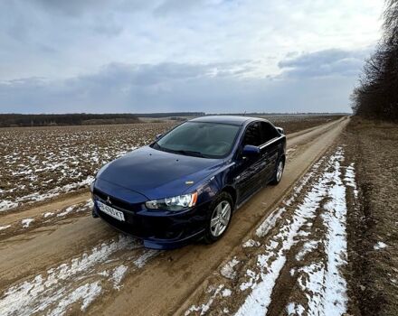 Синий Мицубиси Лансер, объемом двигателя 2 л и пробегом 176 тыс. км за 6400 $, фото 2 на Automoto.ua