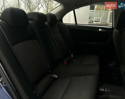 Синій Міцубісі Lancer, об'ємом двигуна 2 л та пробігом 222 тис. км за 5999 $, фото 13 на Automoto.ua