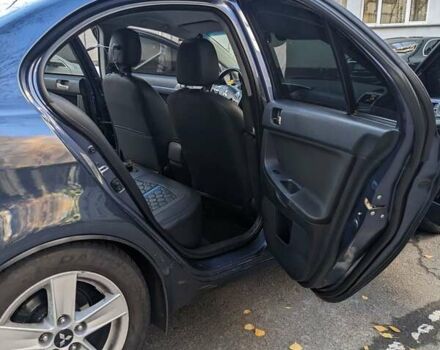 Синий Мицубиси Лансер, объемом двигателя 2 л и пробегом 300 тыс. км за 6250 $, фото 10 на Automoto.ua