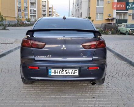 Синій Міцубісі Lancer, об'ємом двигуна 2 л та пробігом 234 тис. км за 6700 $, фото 6 на Automoto.ua