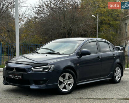 Синій Міцубісі Lancer, об'ємом двигуна 2 л та пробігом 222 тис. км за 5999 $, фото 6 на Automoto.ua