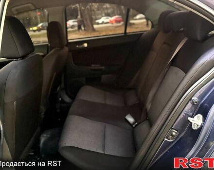 Синий Мицубиси Лансер, объемом двигателя 2 л и пробегом 189 тыс. км за 7350 $, фото 3 на Automoto.ua